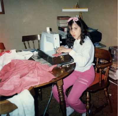 Nicole sewing at 12 years old